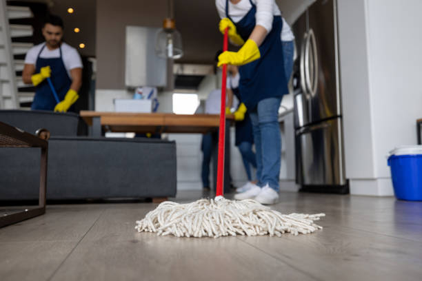 close up on a professional cleaner mopping the floor housework concepts